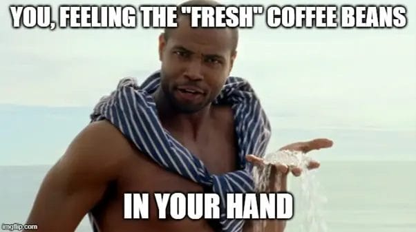 Fresh Coffee beans In Your Hand Image
